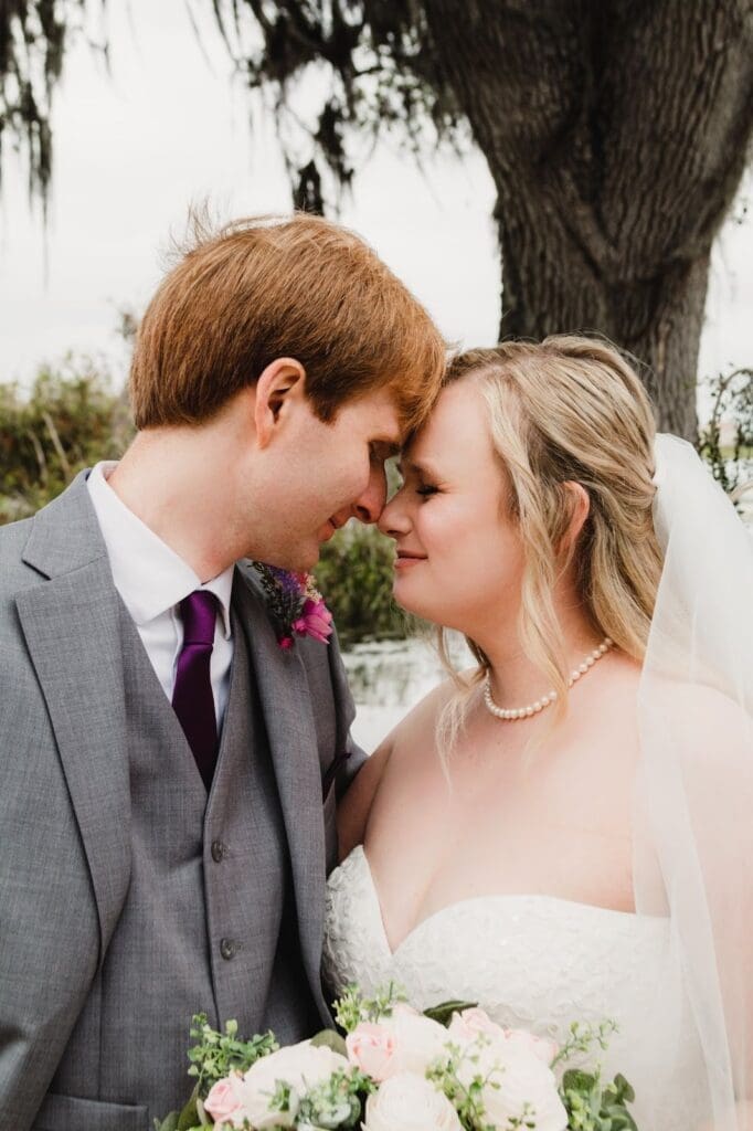 Rosemary and her husband about to kiss for a Wedding planning advice