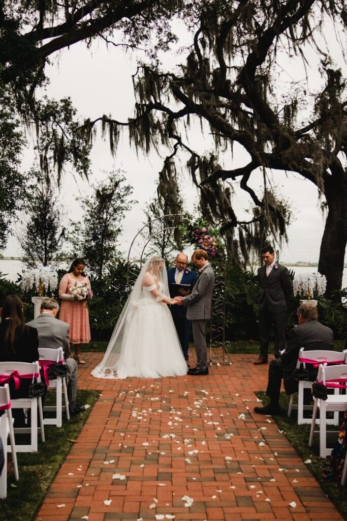Wedding ceremony of Rosemary and her husband in an outdoor wedding venue