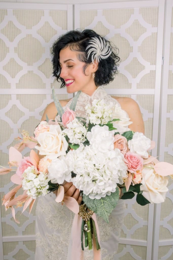 Woman holding elegant florals